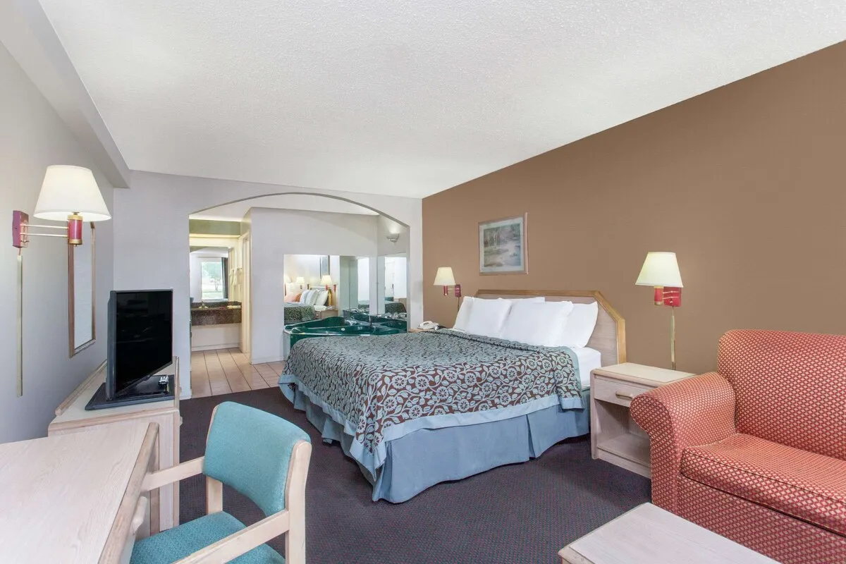 Image of Days Inn by Wyndham Decatur Priceville I-65 Exit 334 with hot tub in room