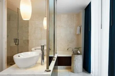 Image of Kimpton EPIC Hotel with hot tub in room