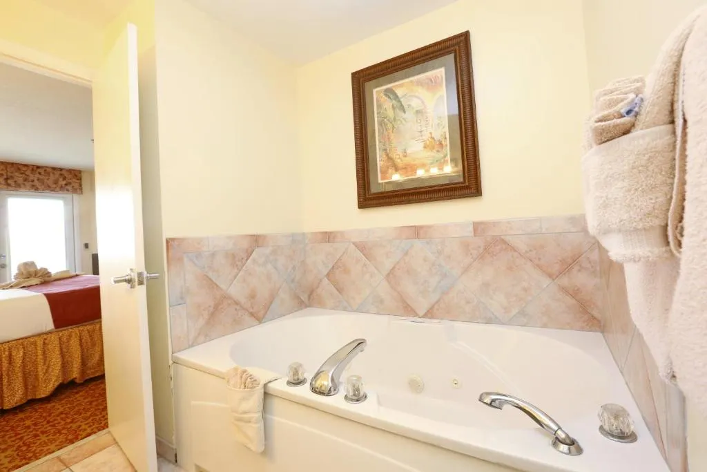 Image of La Fiesta Ocean Inn & Suites with hot tub in room