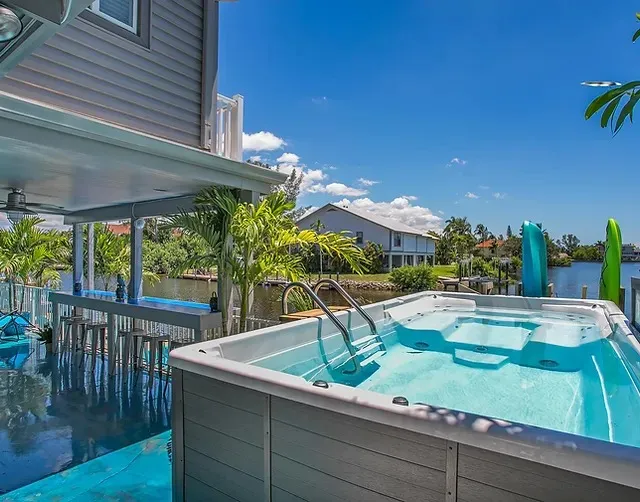 Image of Latitude 26 Waterfront Boutique Resort with hot tub in room