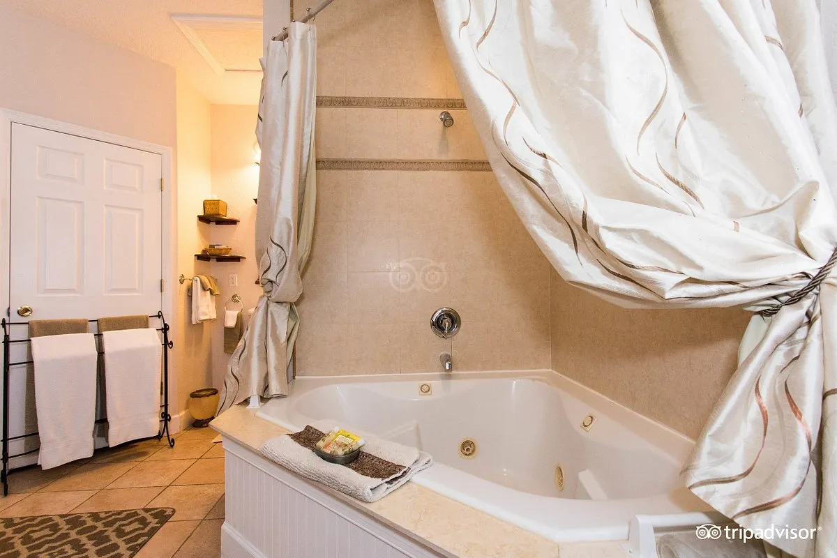 Image of Victorian House Bed & Breakfast with hot tub in room