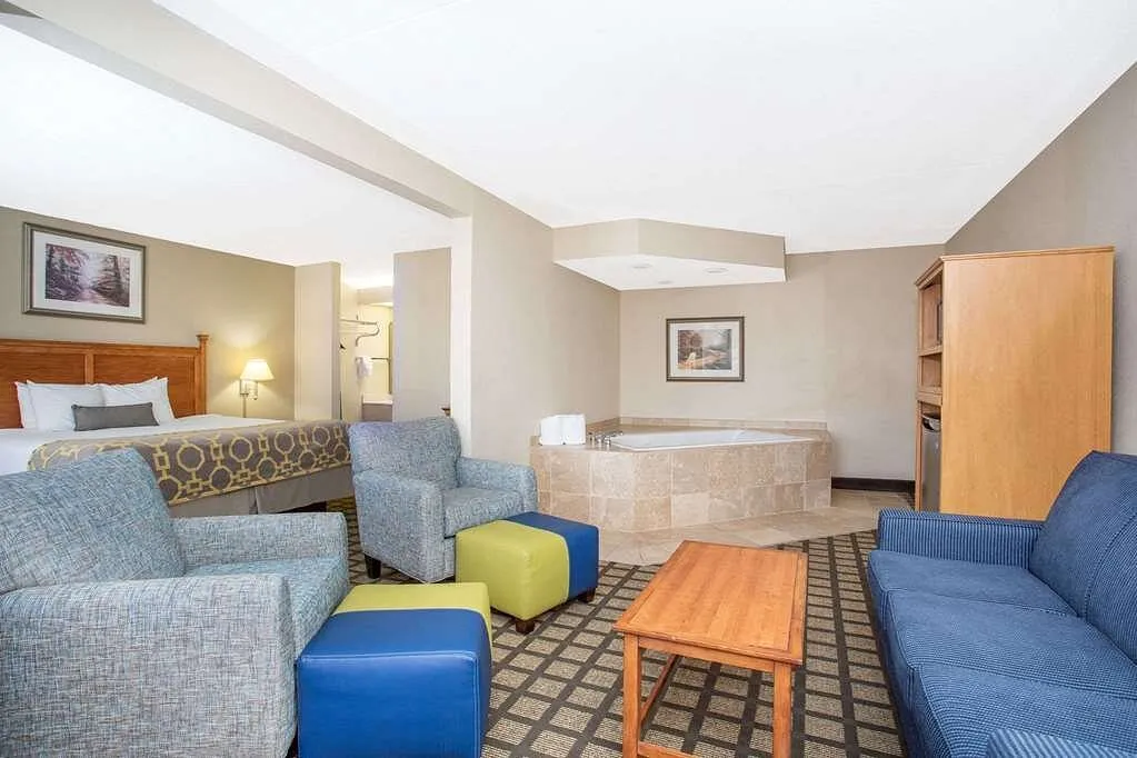 Image of Baymont by Wyndham Hays with hot tub in room