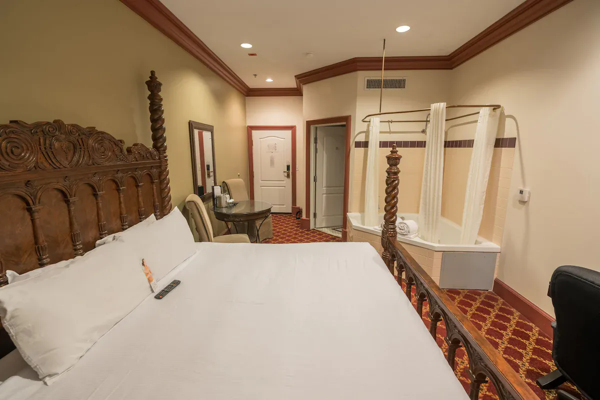 Image of Chateau Avalon Hotel & Spa with hot tub in room