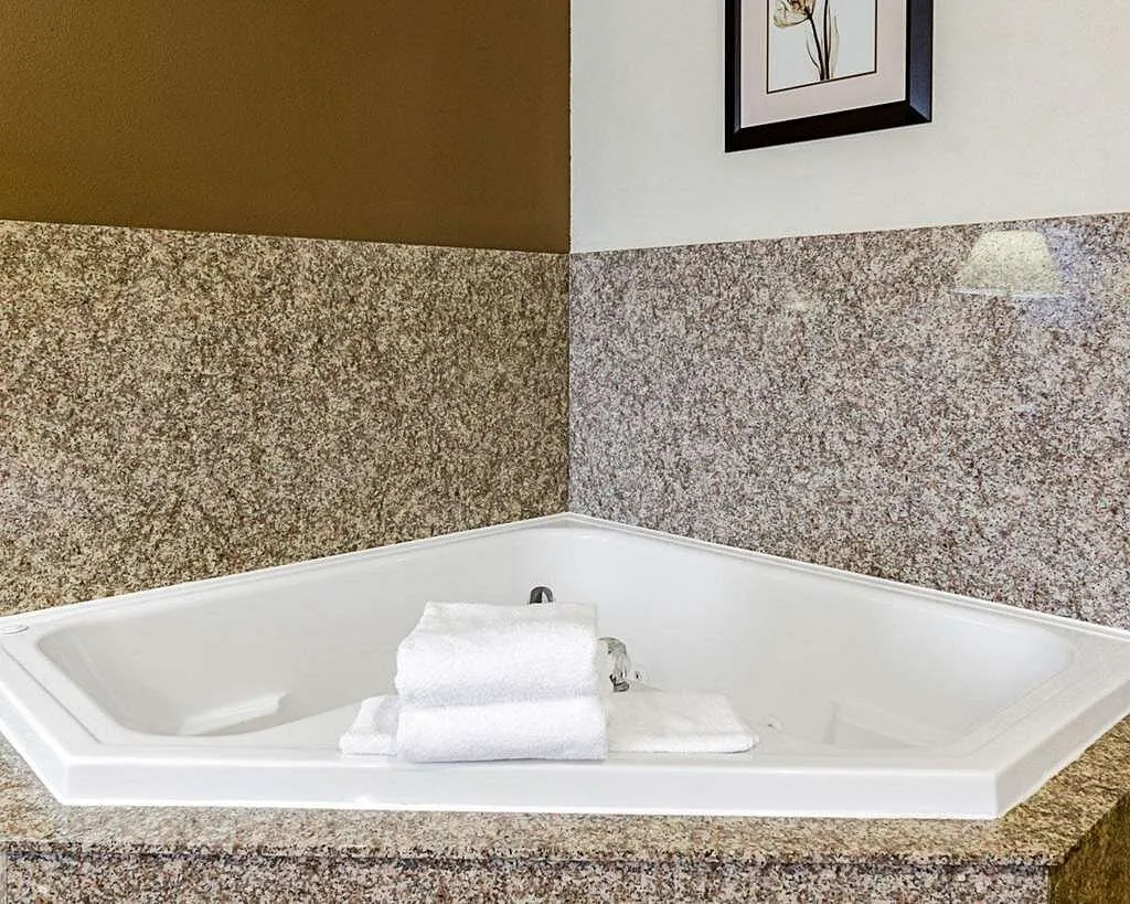 Image of Comfort Inn & Suites Lawrence – University Area with hot tub in room