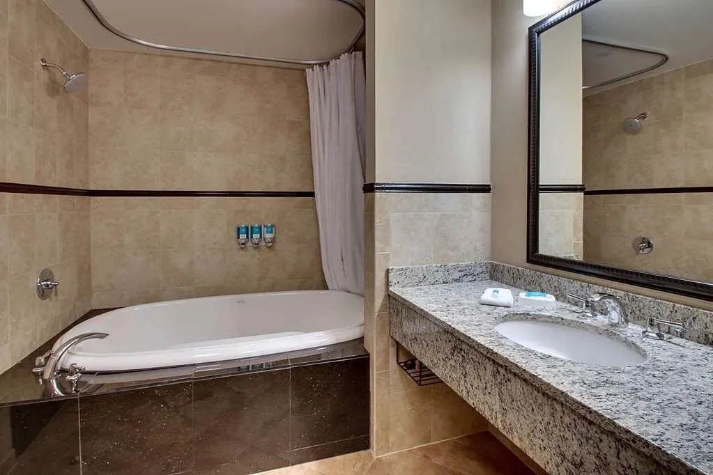Image of Drury Plaza Hotel Broadview Wichita with hot tub in room