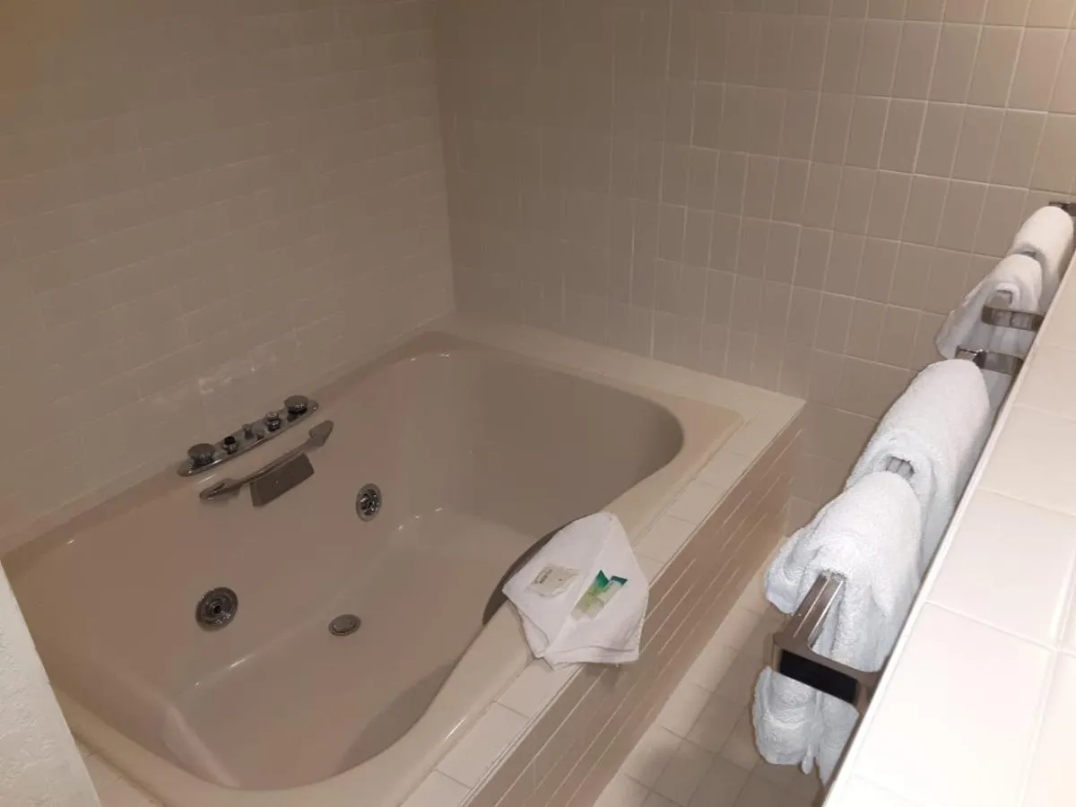 Image of Eleven Boutique Hotel with hot tub in room