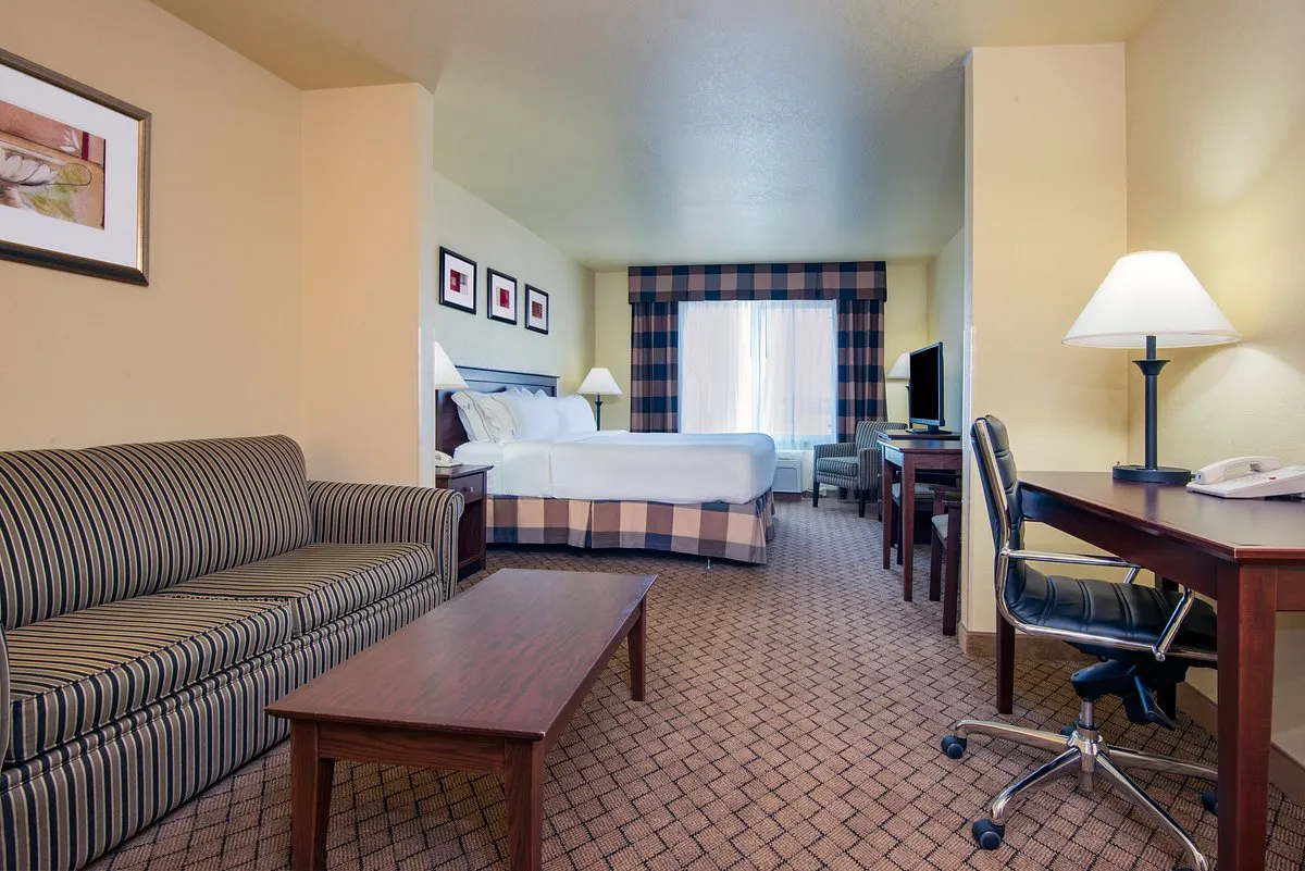 Image of Holiday Inn Express & Suites El Dorado, KS, an IHG Hotel with hot tub in room