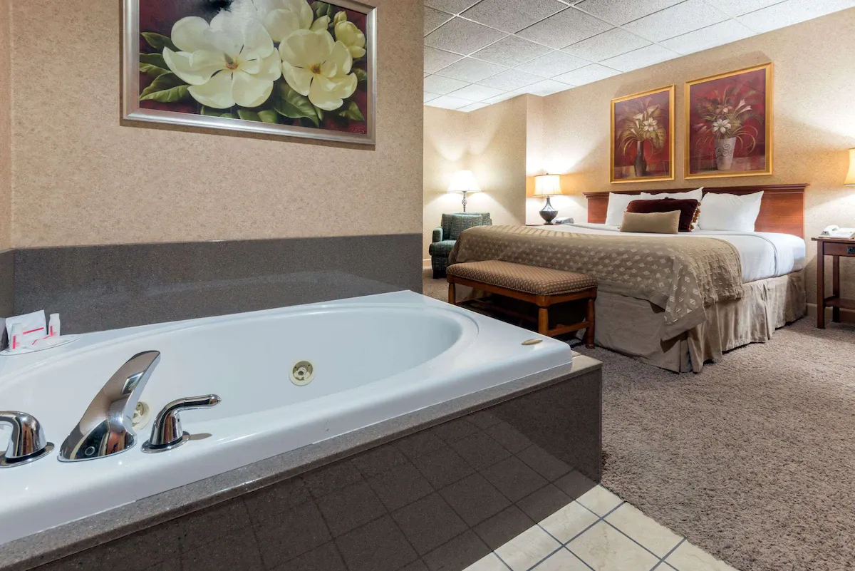Image of Ramada by Wyndham Topeka Downtown Hotel & Convention Center with hot tub in room