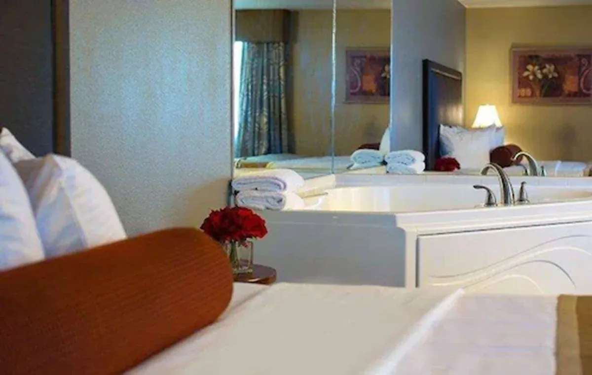 Image of Best Western Plus The Charles Hotel with hot tub in room