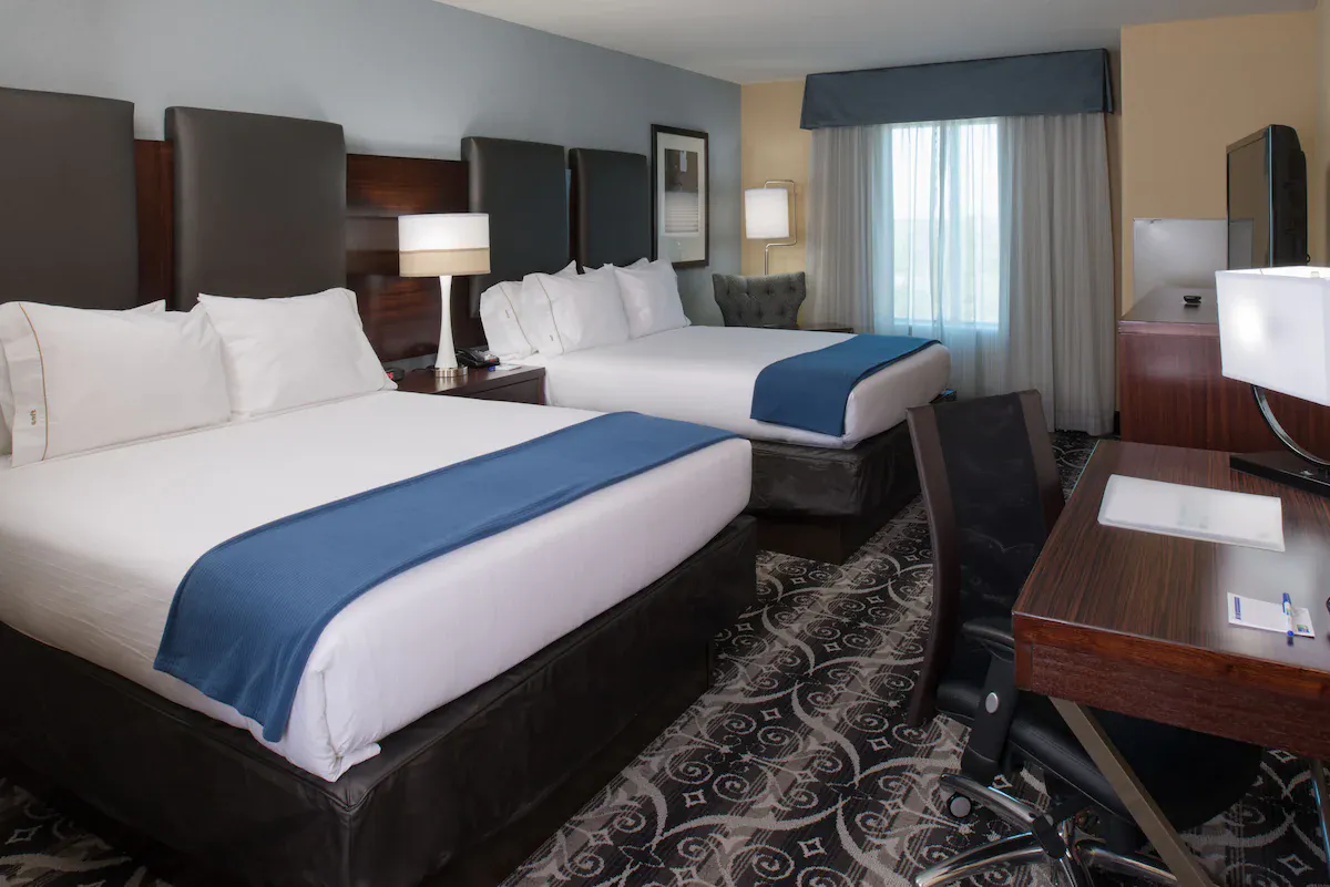 Image of Holiday Inn Express & Suites Kansas City Airport, an IHG Hotel with hot tub in room