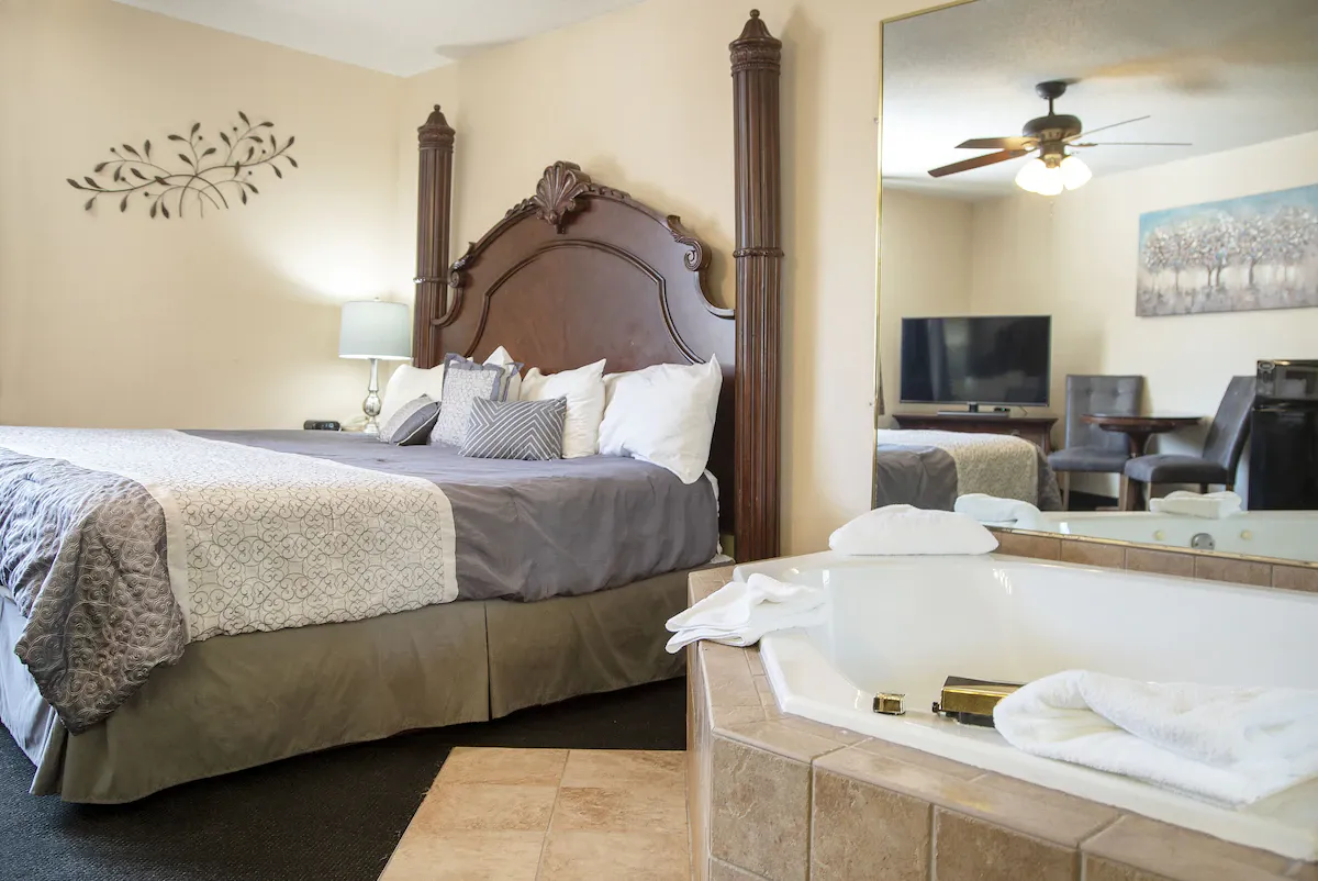 Image of Stone Castle Hotel and Conference Center with hot tub in room