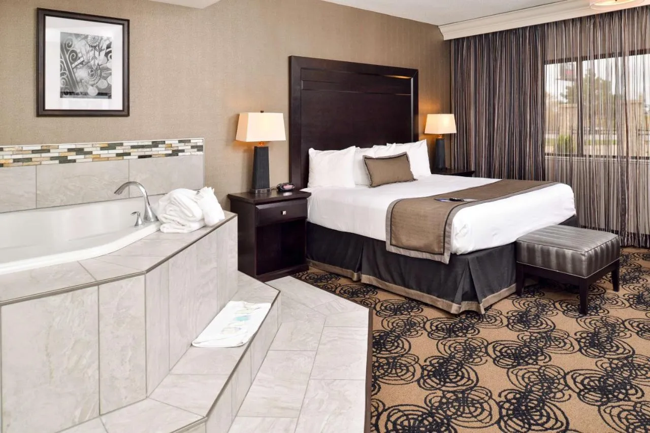 Image of Best Western Plus Midwest Inn with hot tub in room