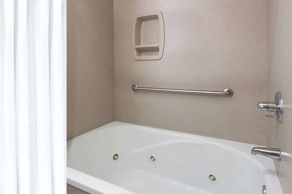 Image of Days Inn by Wyndham Sidney with hot tub in room