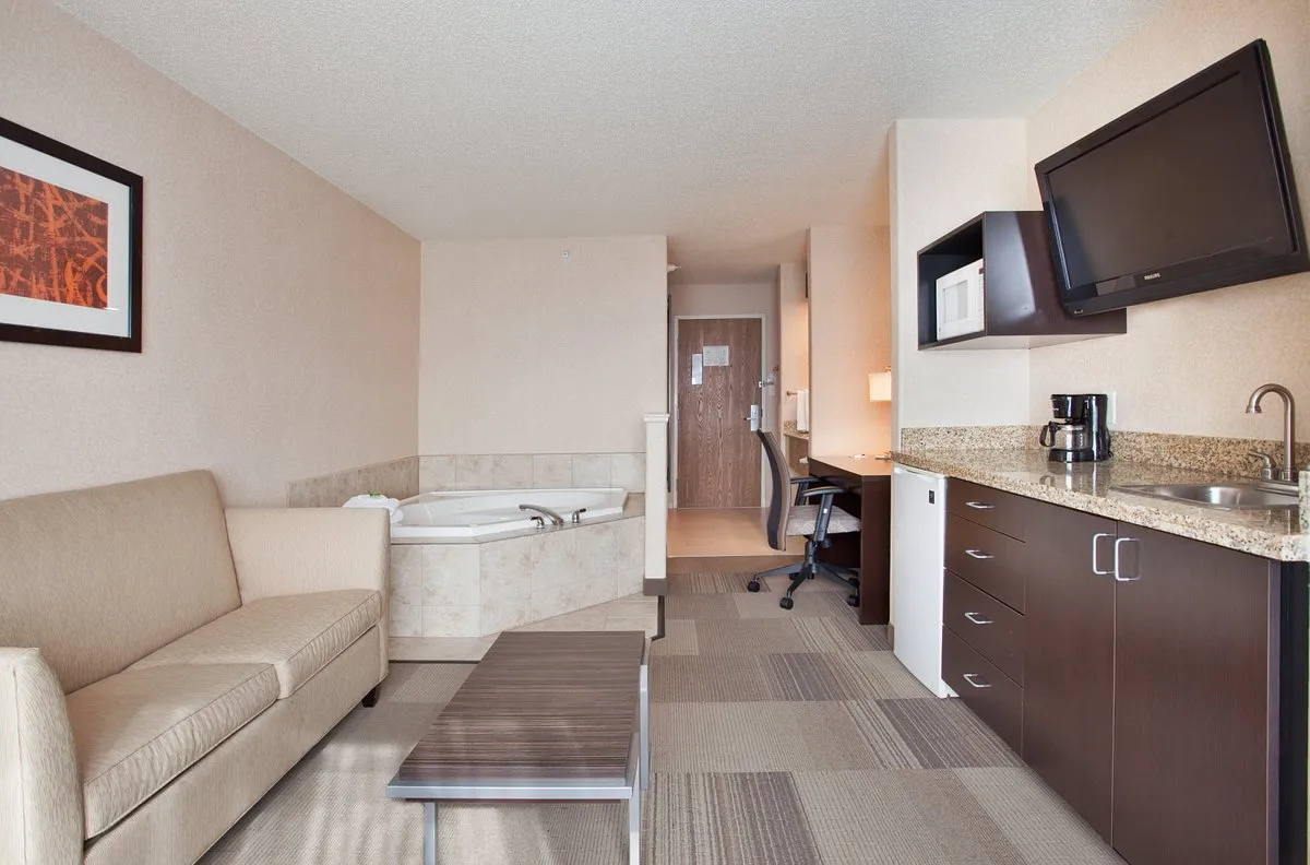 Image of Holiday Inn Express & Suites Beatrice, an IHG Hotel with hot tub in room
