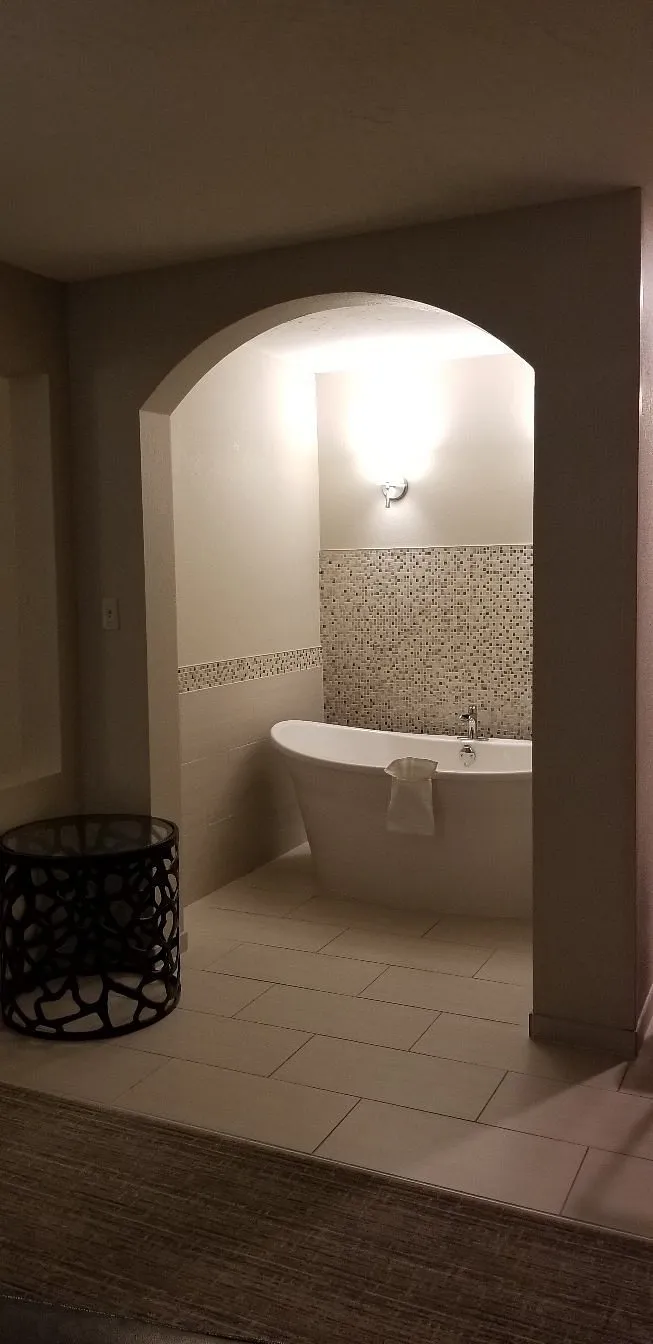 Image of Holiday Inn Express & Suites North Platte, an IHG Hotel with hot tub in room