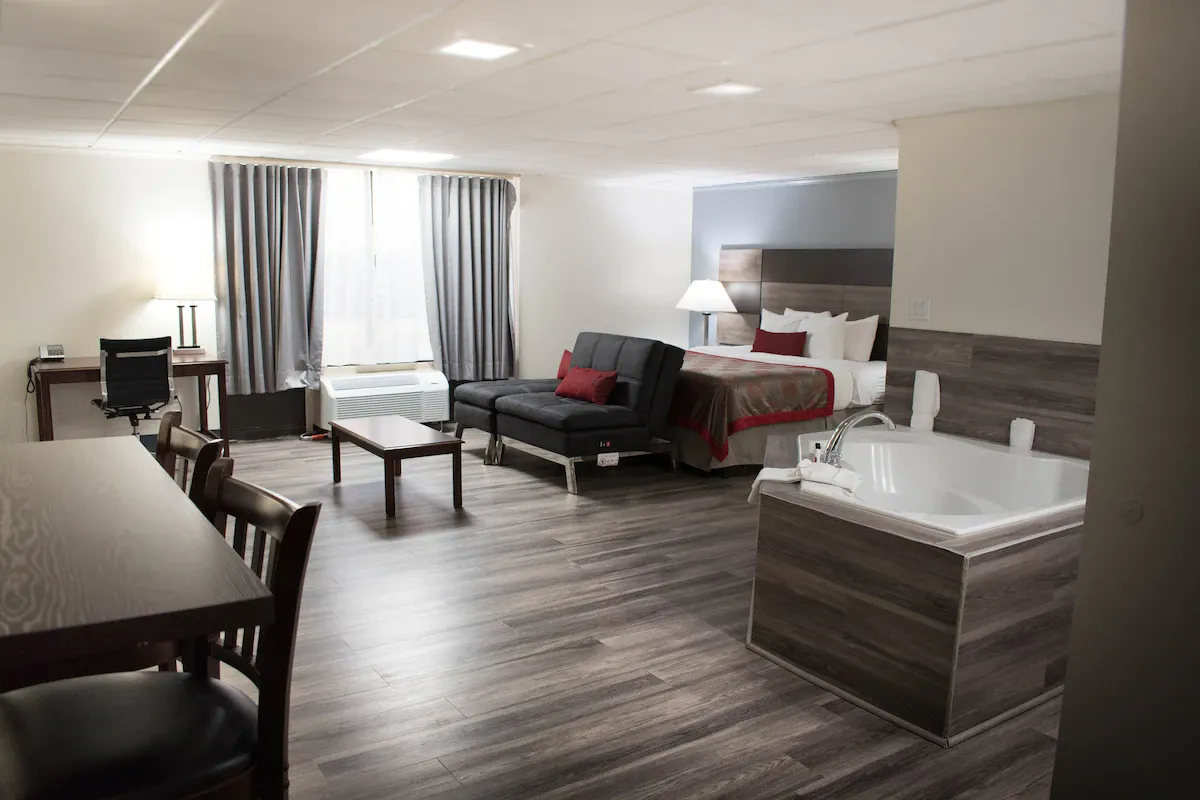 Image of Ramada by Wyndham North Platte & Sandhills Convention Ctr with hot tub in room