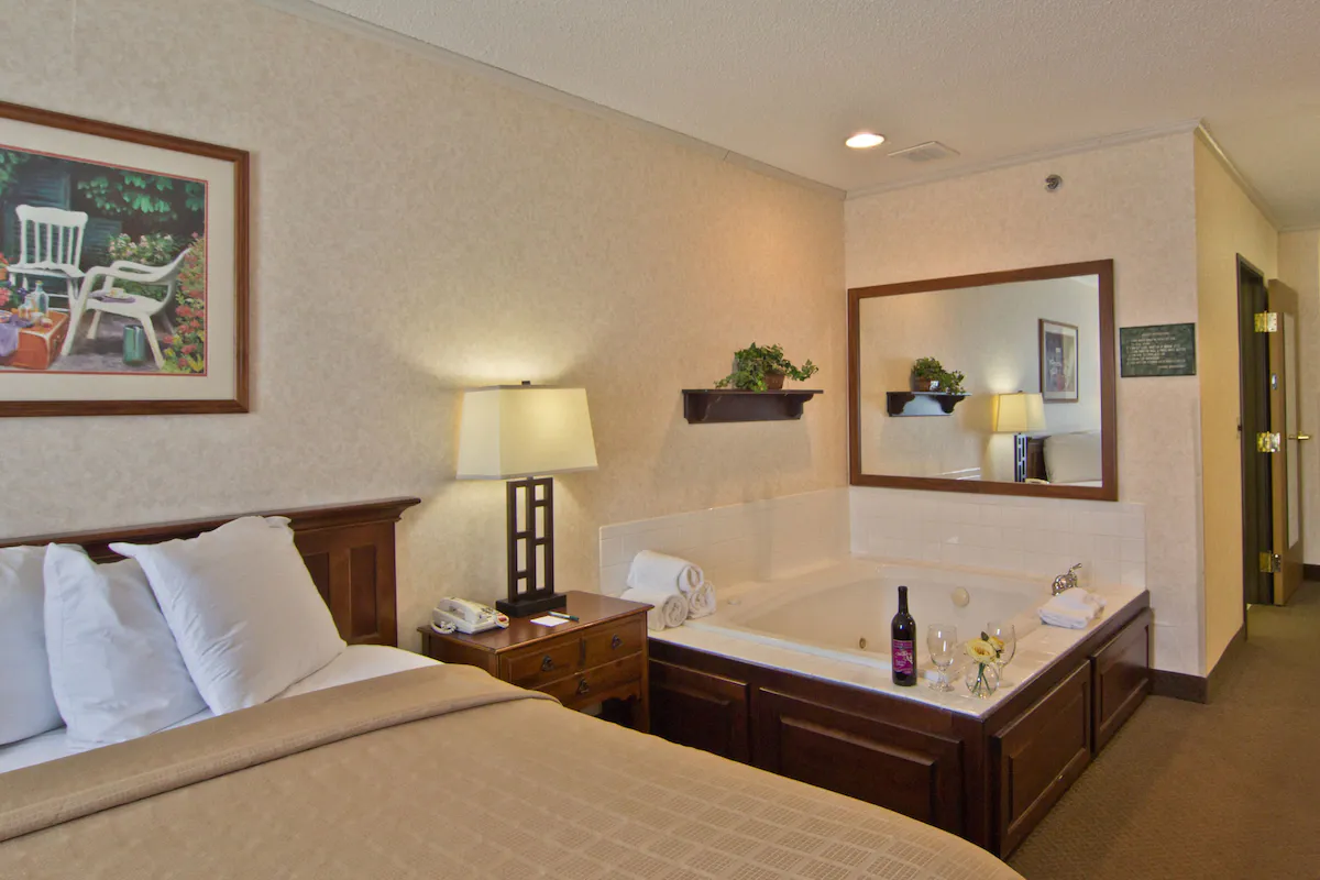 Image of Coshocton Village Inn & Suites with hot tub in room