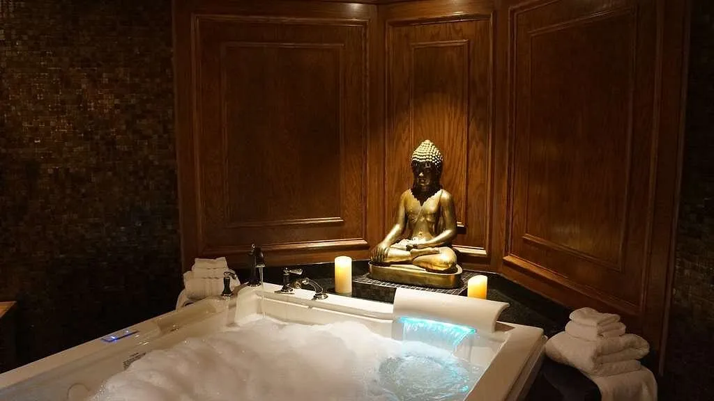 Image of The Grand Resort with hot tub in room
