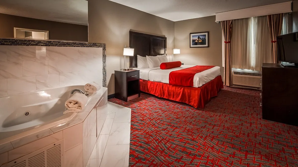 Image of Best Western Airport Inn & Suites with hot tub in room