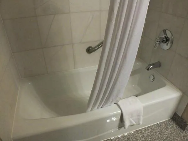 Image of Drury Inn & Suites Greenville with hot tub in room