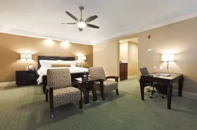 Image of Town & Country Inn and Suites with hot tub in room