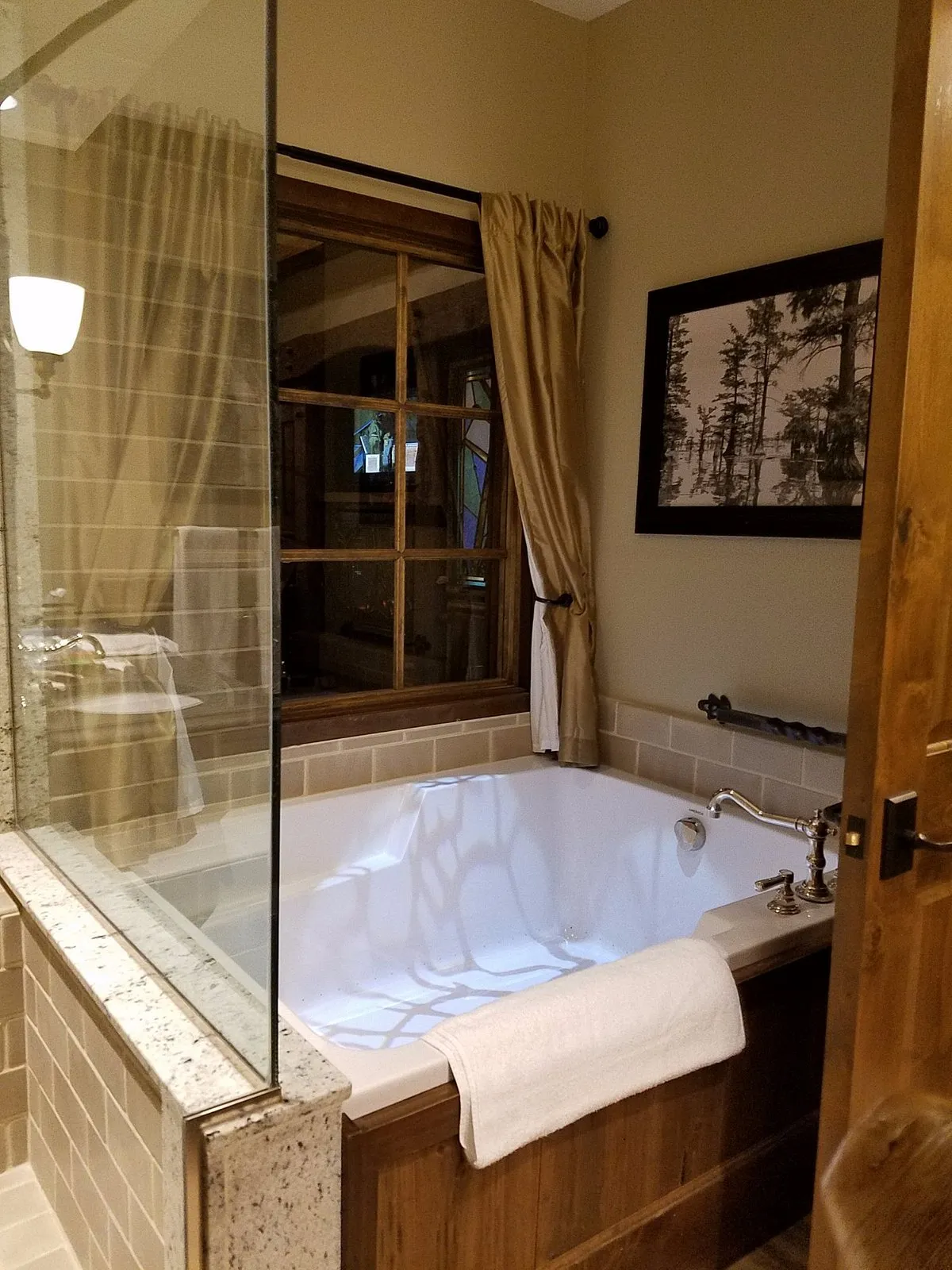 Image of Big Cypress Lodge with hot tub in room
