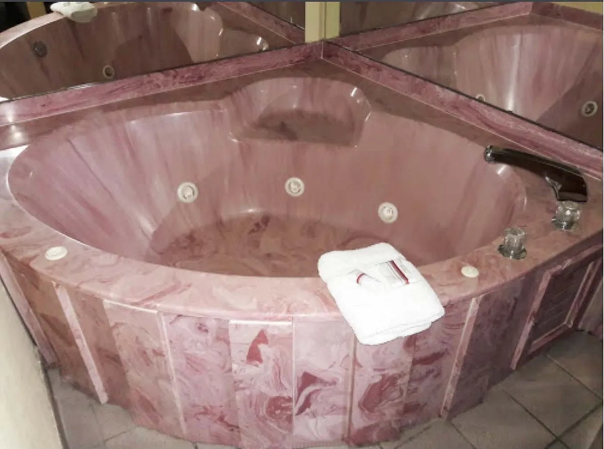 Image of Red Roof Inn Clarksville with hot tub in room
