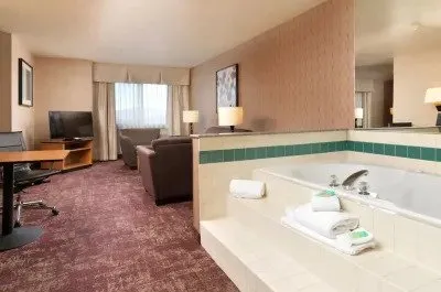 Image of Crystal Inn Hotel & Suites – West Valley City with hot tub in room