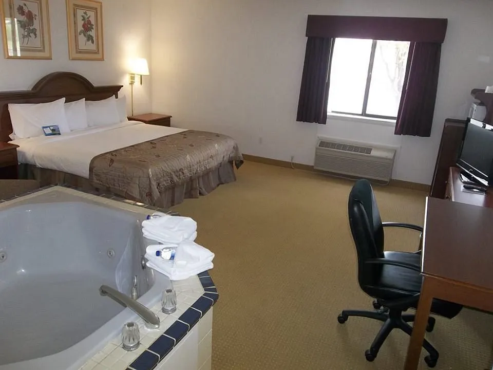 Image of Baymont by Wyndham Marshfield with hot tub in room