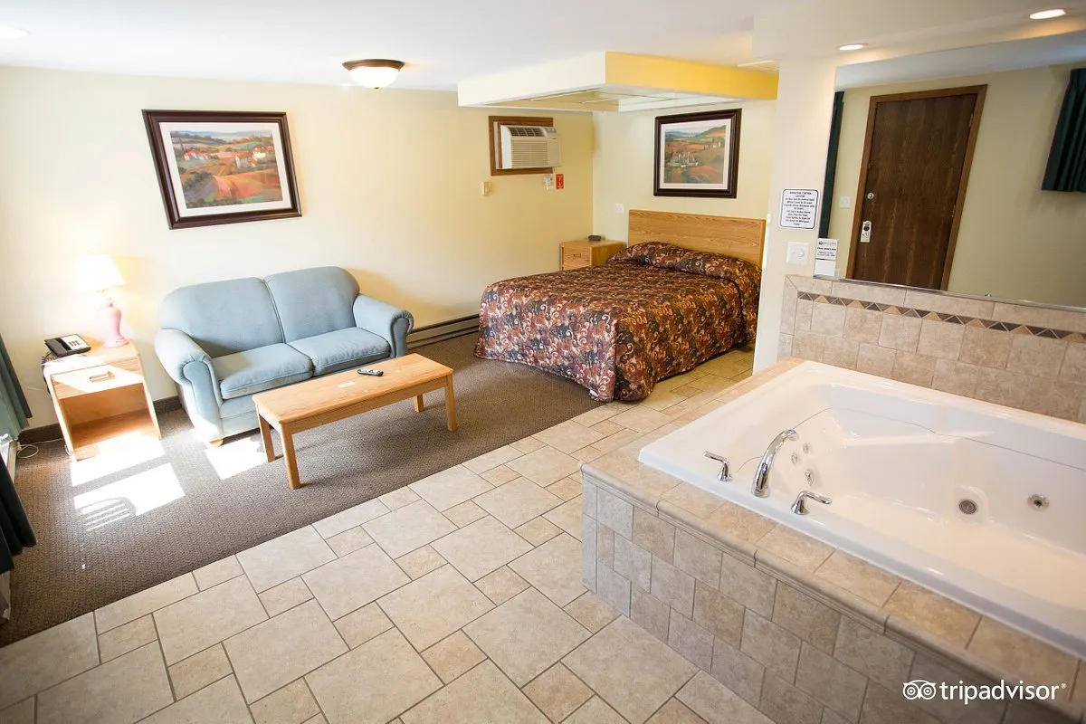 Image of Black Hawk Motel & Suites with hot tub in room