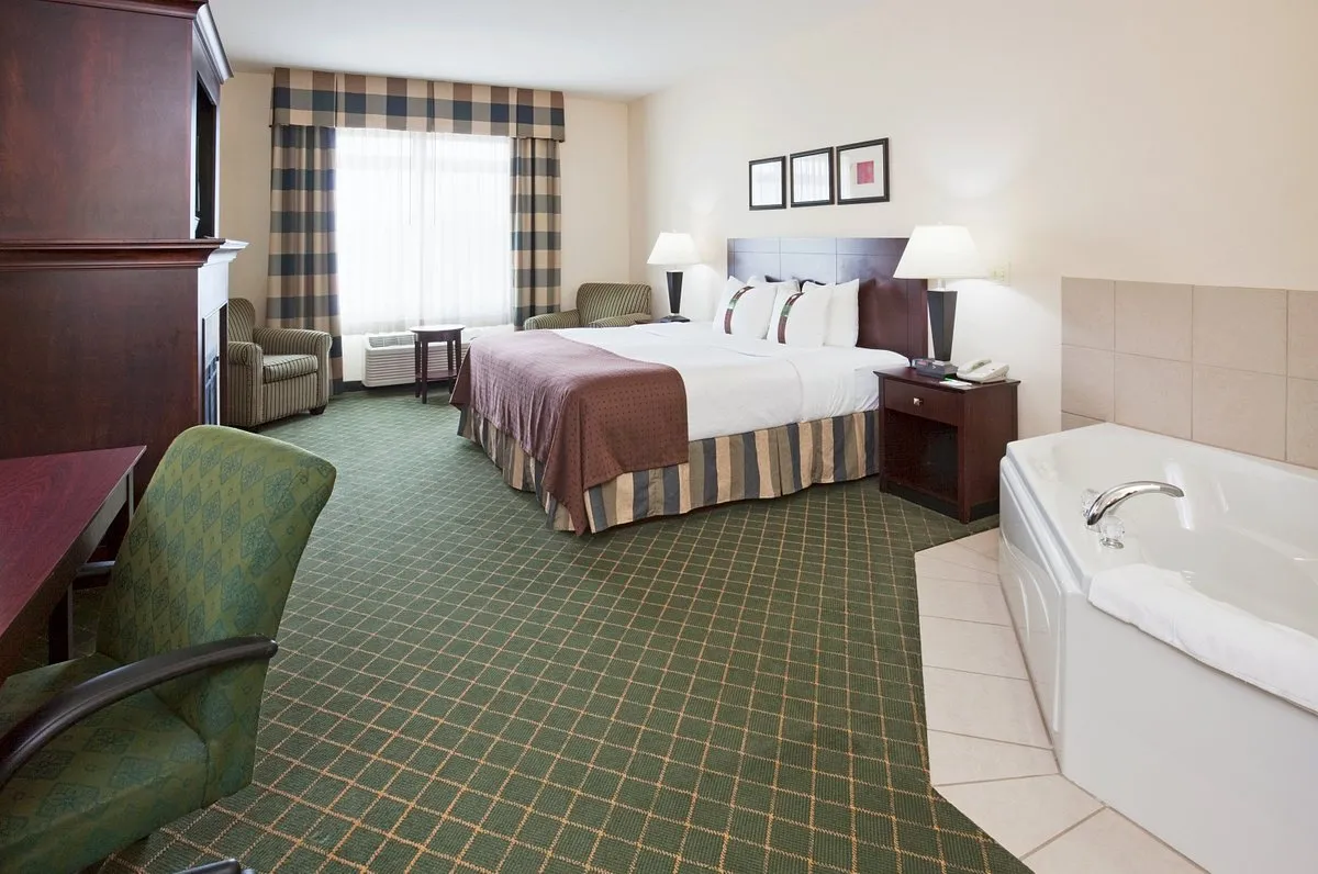 Image of Holiday Inn Conference Ctr Marshfield, an IHG Hotel with hot tub in room